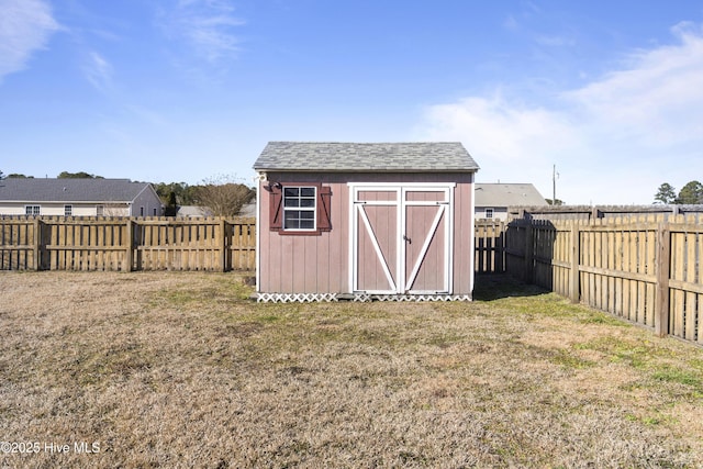 view of outdoor structure with a yard