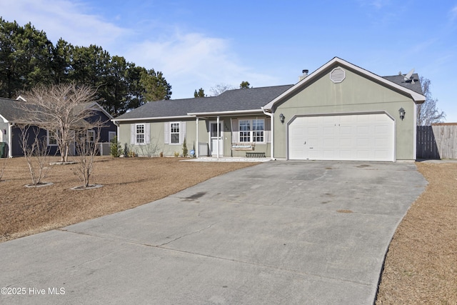 ranch-style house featuring a garage