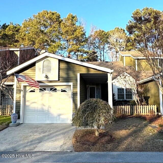 view of front of property featuring a garage