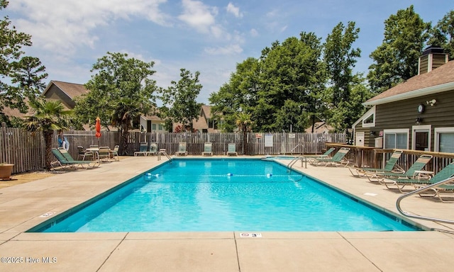 view of pool with a patio