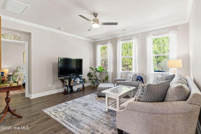 living room featuring ornamental molding, ceiling fan, and dark hardwood / wood-style floors