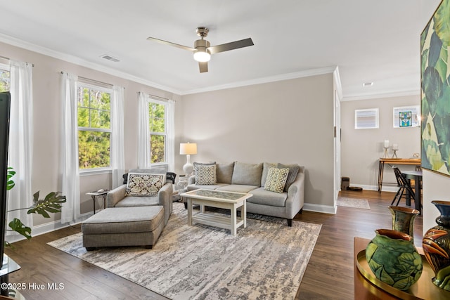 living room featuring ceiling fan, crown molding, and dark hardwood / wood-style floors