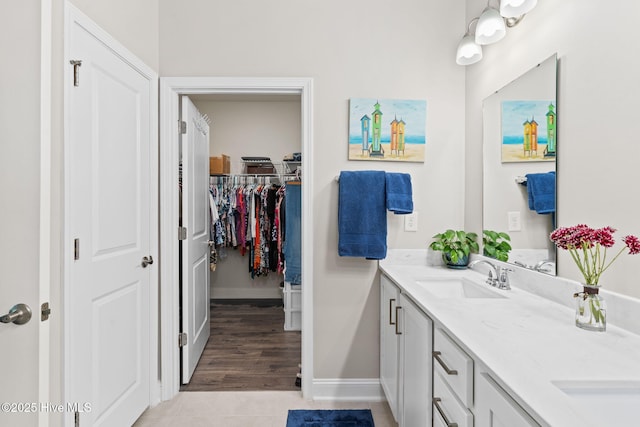 bathroom featuring tile patterned floors and vanity