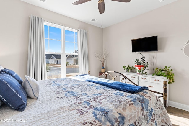 bedroom featuring ceiling fan and wood-type flooring