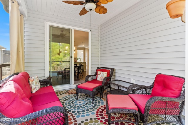 view of patio featuring ceiling fan