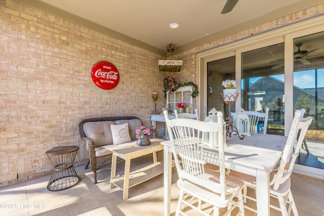 view of patio / terrace featuring an outdoor living space and ceiling fan