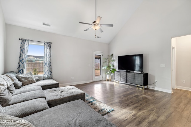 living room with high vaulted ceiling, ceiling fan, and hardwood / wood-style flooring