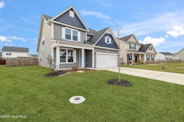 craftsman house featuring covered porch, a front lawn, and a garage