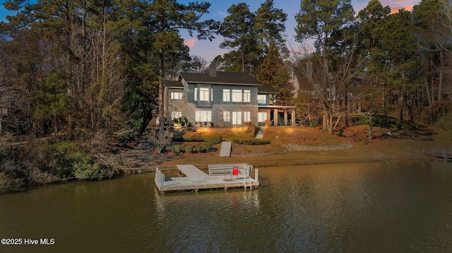 dock area featuring a water view