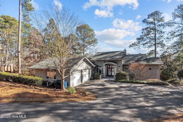 single story home with a garage