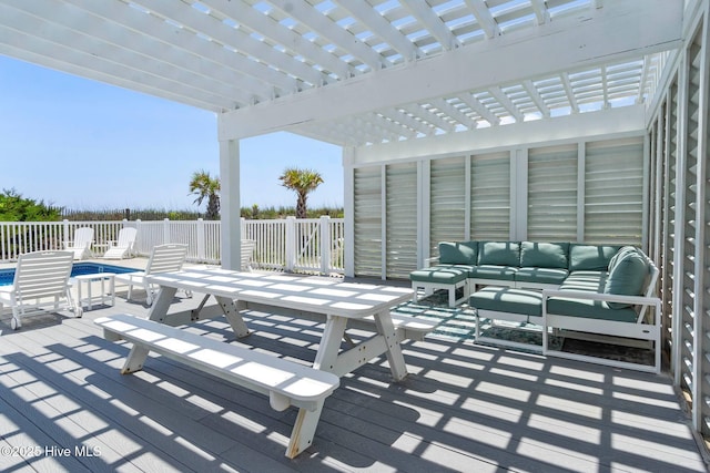 view of patio / terrace with outdoor lounge area, a fenced in pool, and a pergola