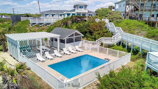 view of pool with a patio area and a pergola