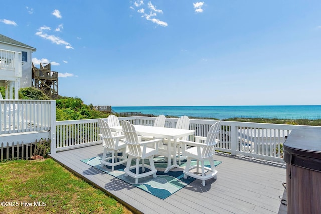 wooden terrace with a water view