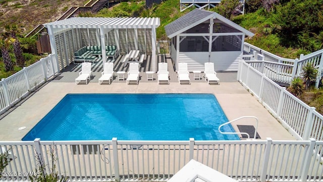 view of swimming pool featuring a pergola and a patio area