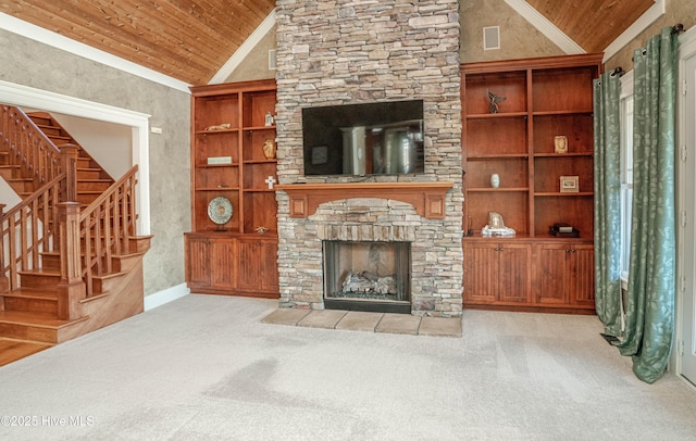 carpeted living room featuring wood ceiling, lofted ceiling, and a fireplace