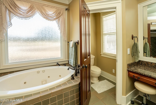 bathroom with toilet, a wealth of natural light, tile patterned flooring, and tiled bath