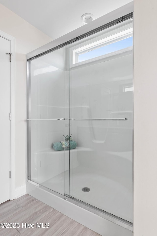 bathroom with an enclosed shower