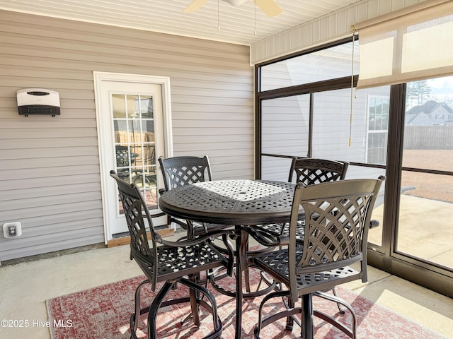 sunroom / solarium with ceiling fan