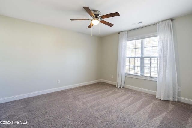 carpeted empty room with ceiling fan