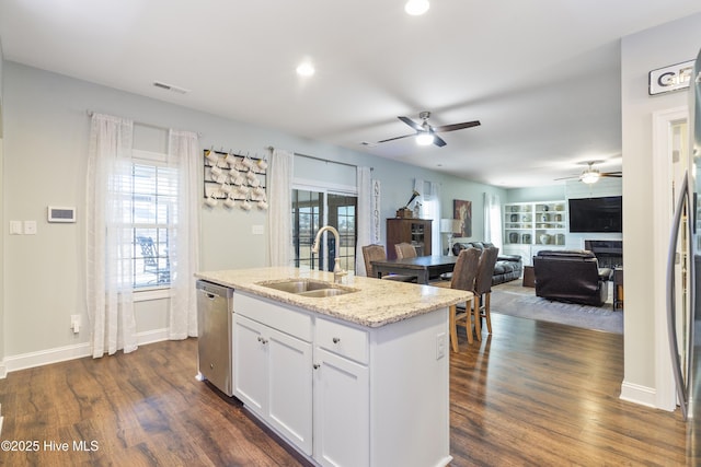 kitchen with sink, white cabinetry, a kitchen island with sink, dark hardwood / wood-style flooring, and stainless steel dishwasher