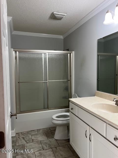 bathroom with a textured ceiling, toilet, vanity, visible vents, and crown molding