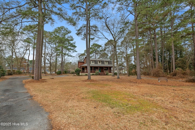 view of front of home with aphalt driveway