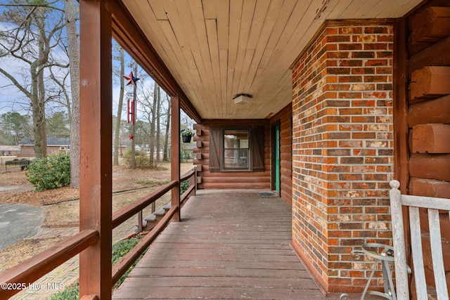 wooden deck with a porch