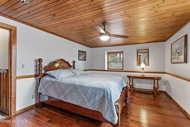 bedroom featuring dark wood-type flooring and ornamental molding