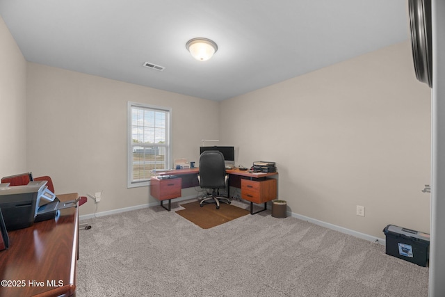 view of carpeted office space