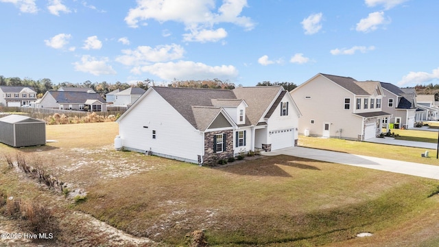 view of front facade with a garage and a front yard