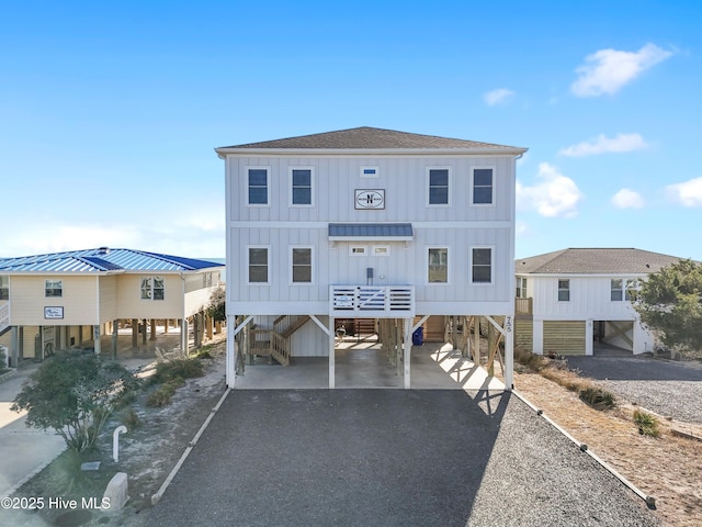 raised beach house with a carport