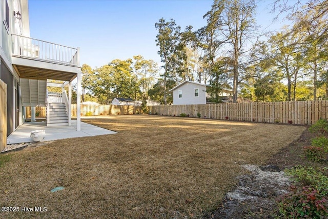 view of yard with a patio area