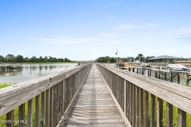 view of dock with a water view