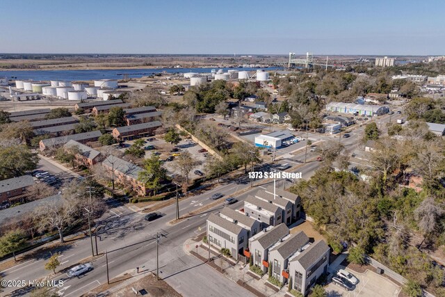 drone / aerial view with a water view