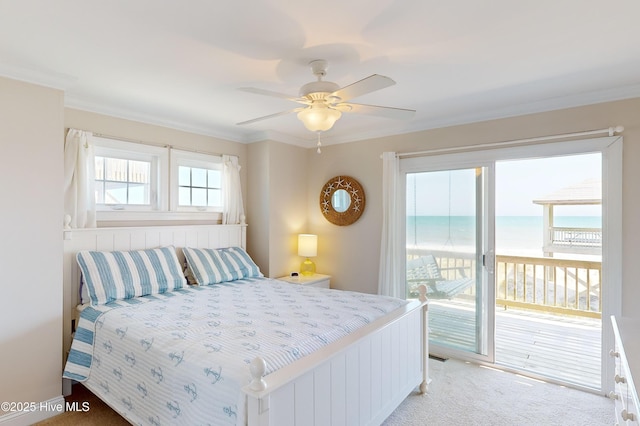 carpeted bedroom with access to outside, a water view, ceiling fan, and ornamental molding