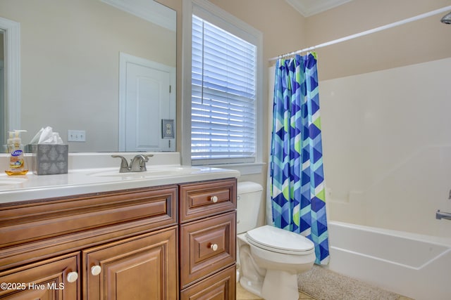 full bathroom featuring vanity, shower / tub combo with curtain, crown molding, tile patterned flooring, and toilet