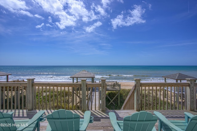 1280 New River Inlet Rd, North Topsail Beach, NC 28460 - wooden deck featuring view of water and beach