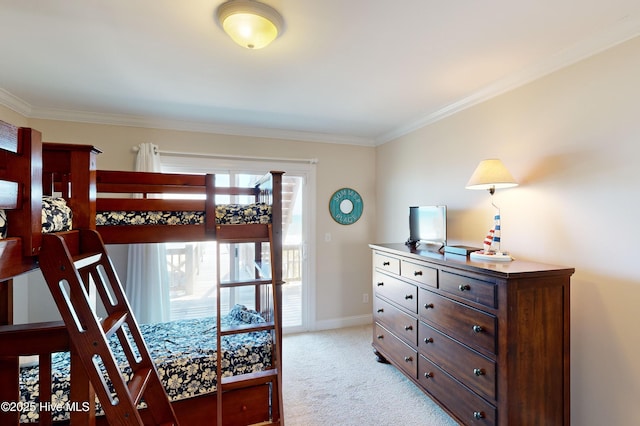 carpeted bedroom featuring crown molding