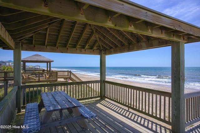1280 New River Inlet Rd, North Topsail Beach, NC 28460 - wooden deck with a gazebo and view of water and beach