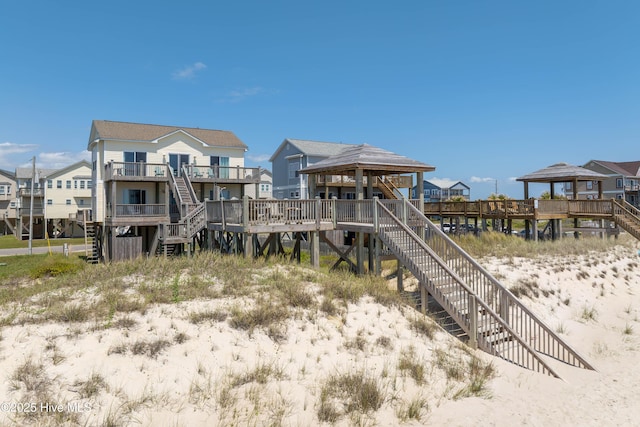 1280 New River Inlet Rd, North Topsail Beach, NC 28460 - view of playground featuring stairs, a gazebo, and a residential view