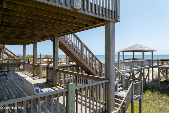 wooden terrace with a water view