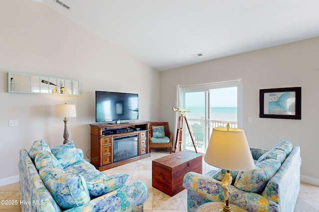 1280 New River Inlet Rd, North Topsail Beach, NC 28460 - living room featuring baseboards and light tile patterned floors