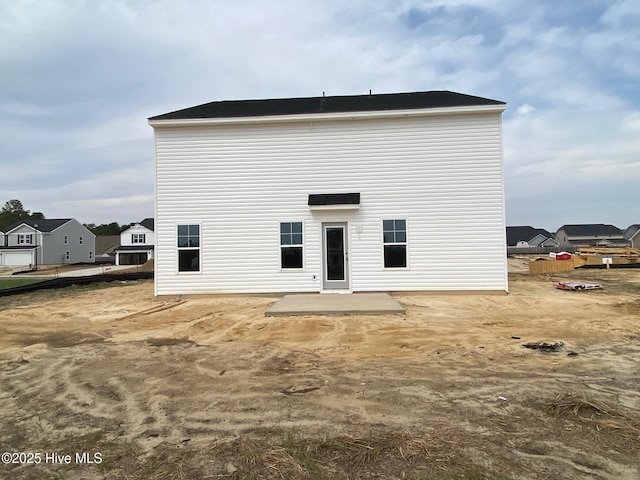 rear view of house featuring a patio area