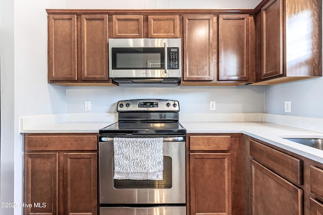 kitchen with appliances with stainless steel finishes