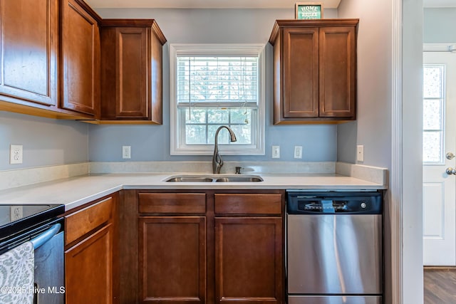 kitchen with appliances with stainless steel finishes and sink