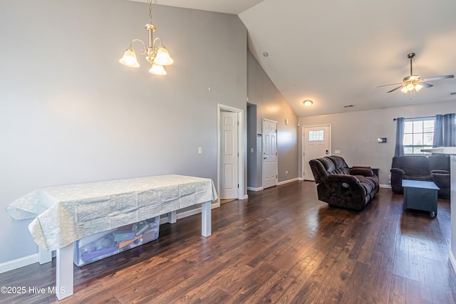 bedroom with a notable chandelier, high vaulted ceiling, and dark hardwood / wood-style floors