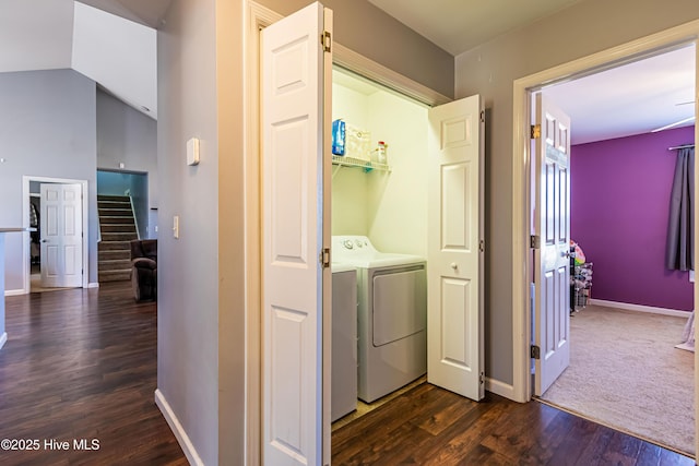 washroom with dark hardwood / wood-style floors and independent washer and dryer