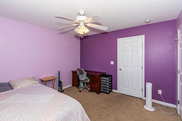 bedroom with ceiling fan and carpet floors