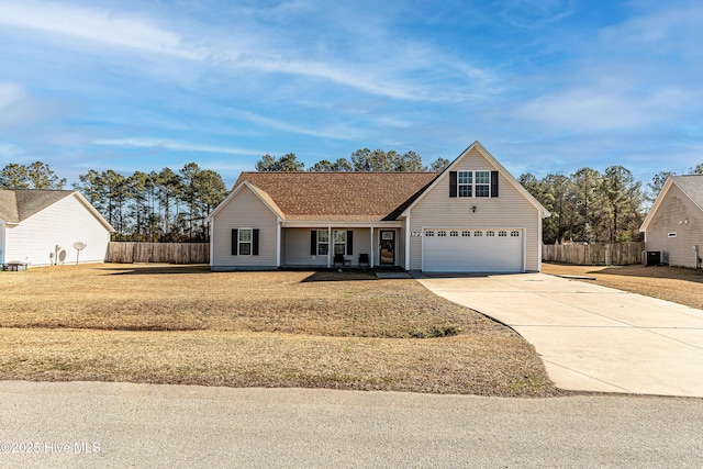 view of front facade featuring a front lawn and central air condition unit