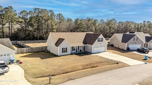 view of front of home with a garage and a front yard